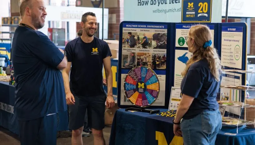 People talking during a poster symposium